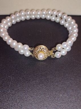Classic White Pearl Double-Strand Bracelet with 14k Gold  clasp and 2 spacers.